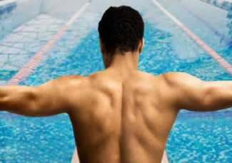 man preparing to swim