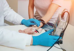Doctor using EMG with a patient