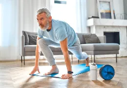 older man stretching