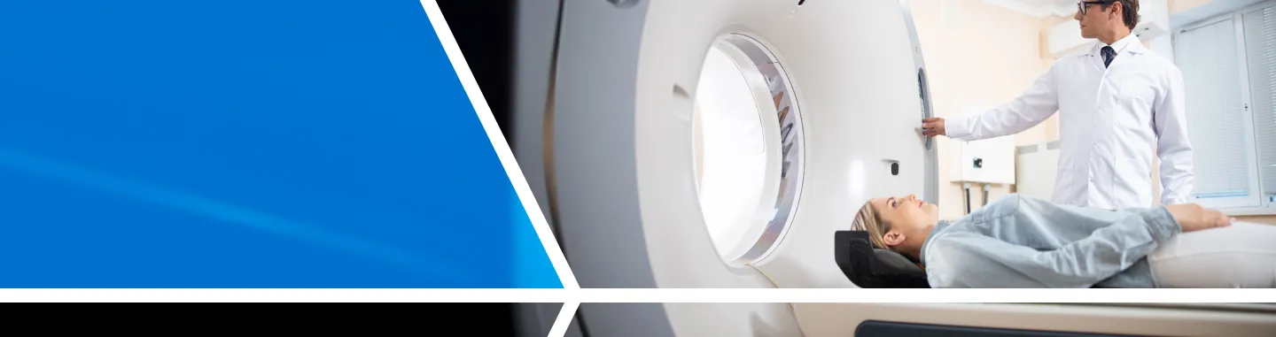 doctor helping patient with CT Scan
